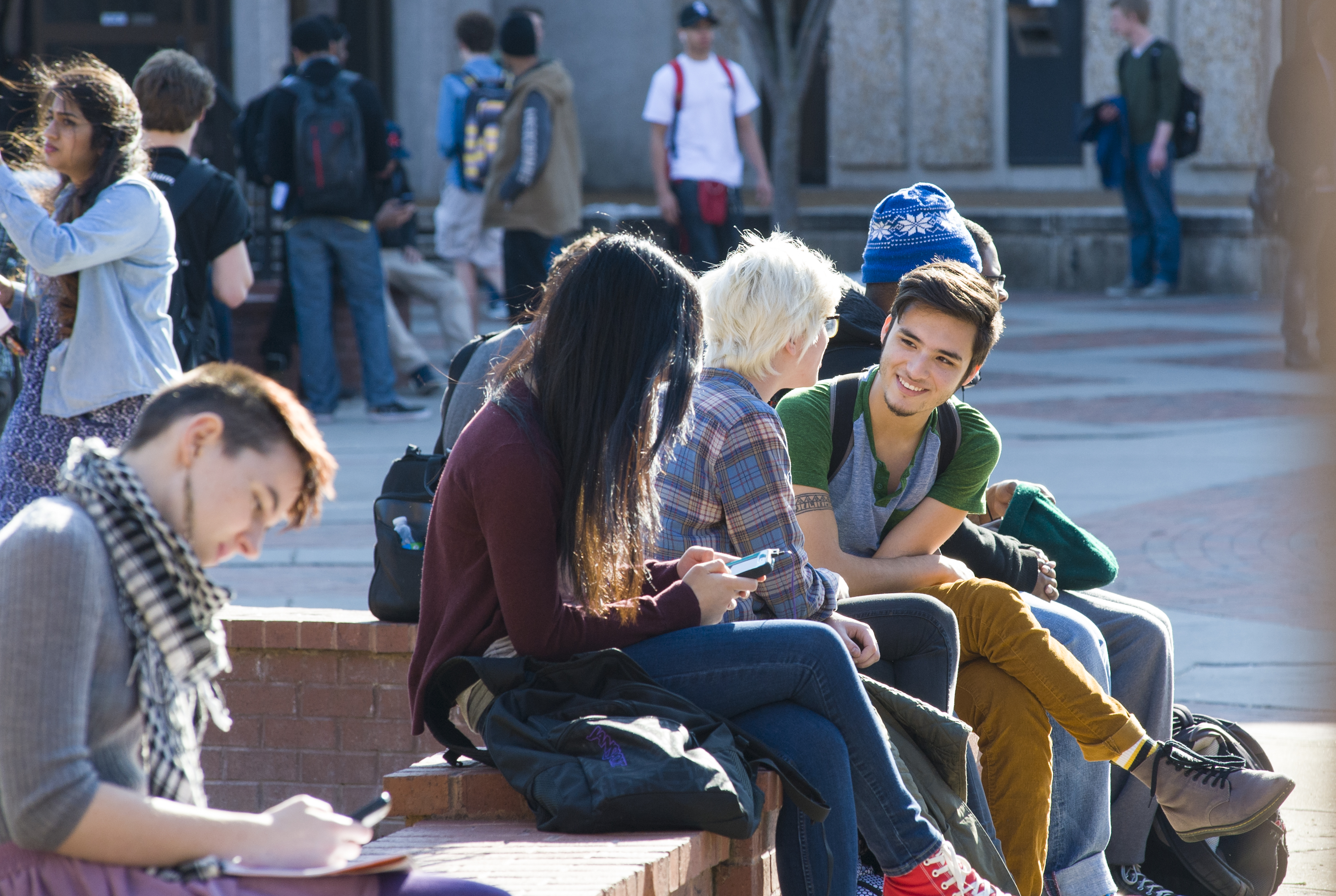 Students sitting around campus